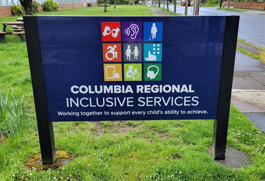 Sign for Columbia Regional Inclusive Services on front lawn